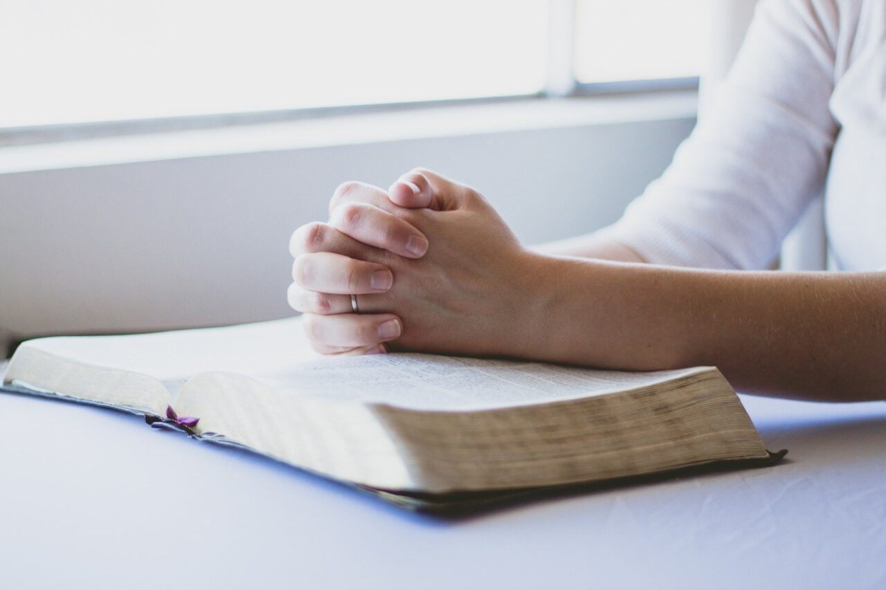 hands and bible